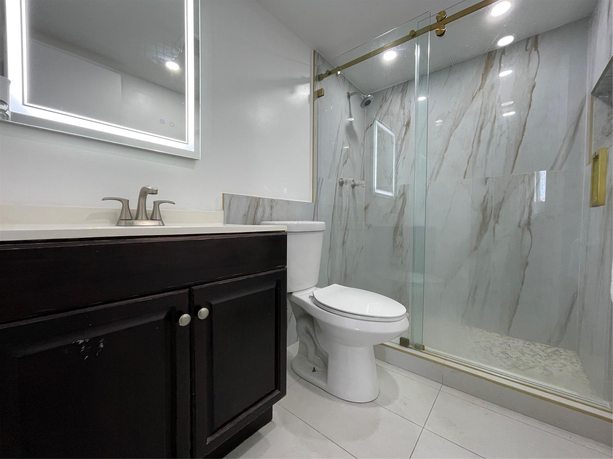 Best Priced 3/2 in the area!! Newly renovated bathrooms and kitchen with stainless steel appliances, soft closed cabinets. Laminate flooring. Brand new oversize screened balcony, New roof, New Hurricane Impact windows and sliding door, New AC & water heater & New elevator, Plenty of guest parking. Adjacent to community pool in this quiet beautiful community. A+ school district, great space for entertaining and so much to do in the area. Don't miss this opportunity to own your turn key unit.