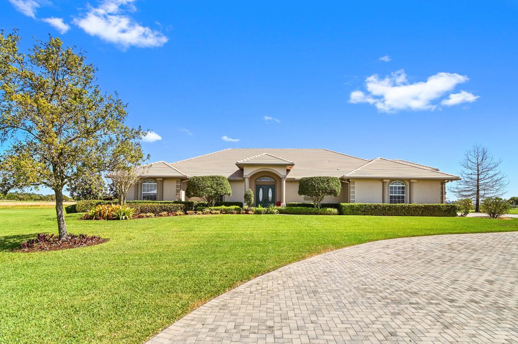 Photo of 5855 SW Saddlebrook Lane, Palm City, FL 34990 (MLS # R10870360)