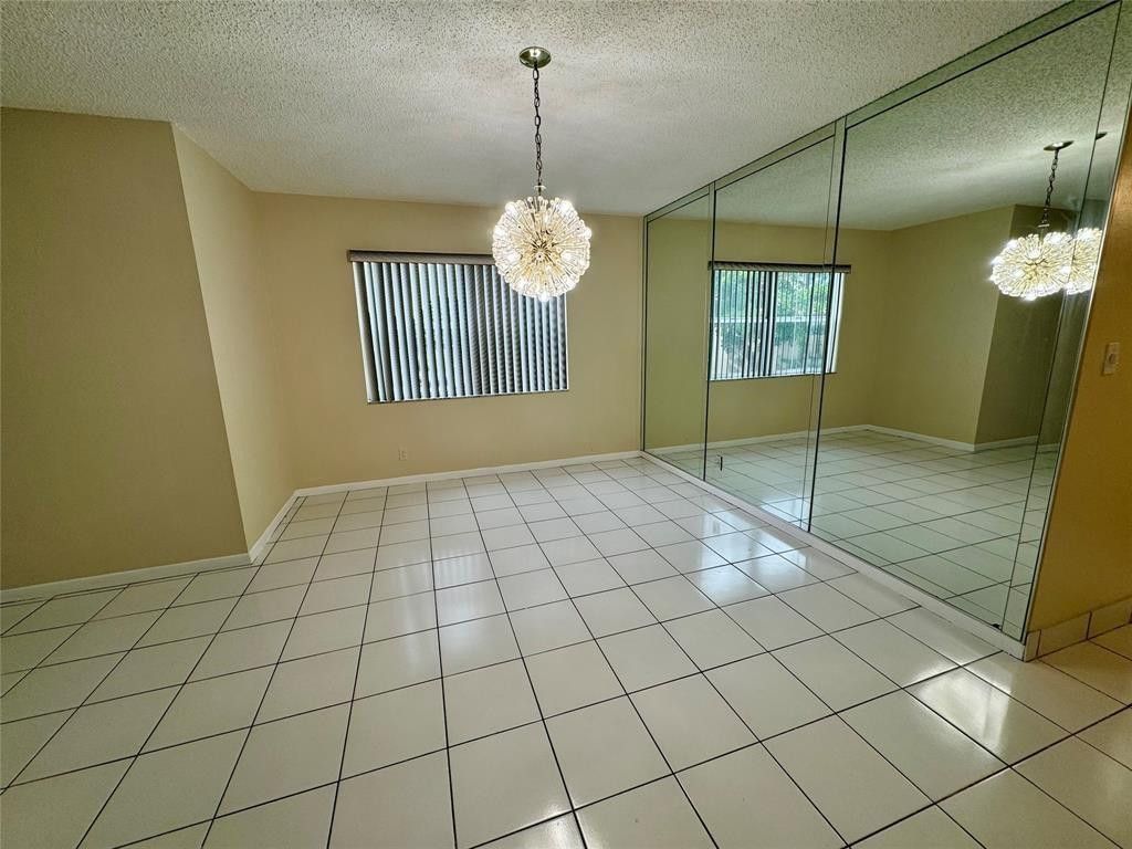 Photo of 6061 N Falls Cir Drive #301, Lauderhill, FL 33319 (MLS # B26000121)