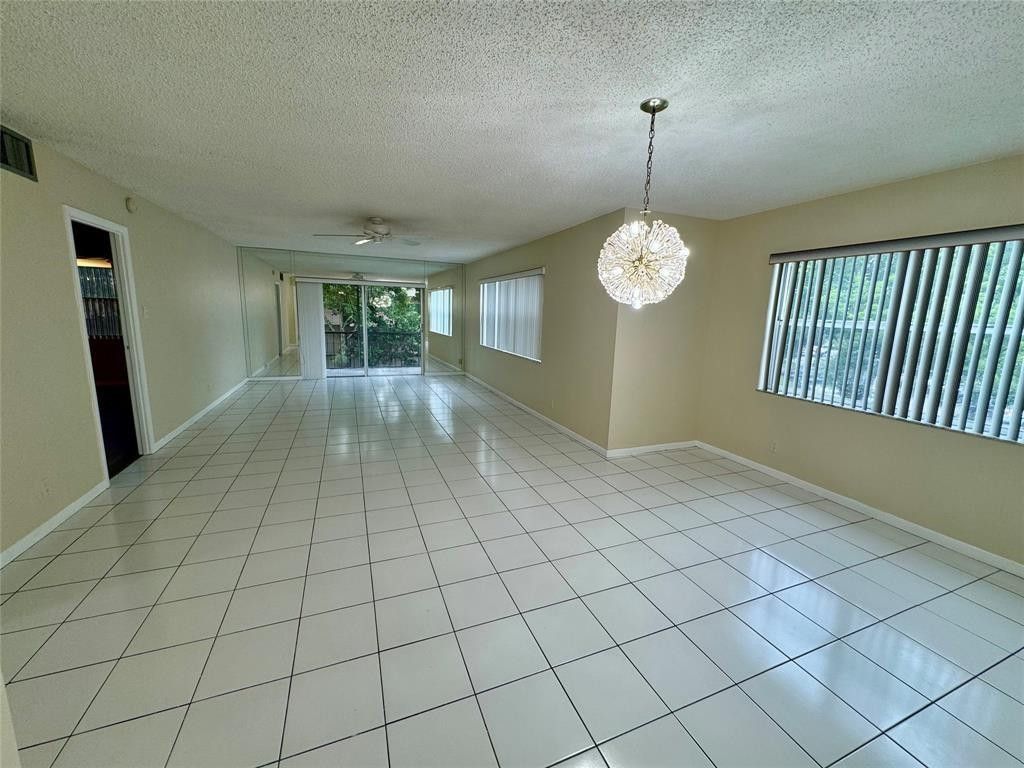 Photo of 6061 N Falls Cir Drive #301, Lauderhill, FL 33319 (MLS # B26000121)