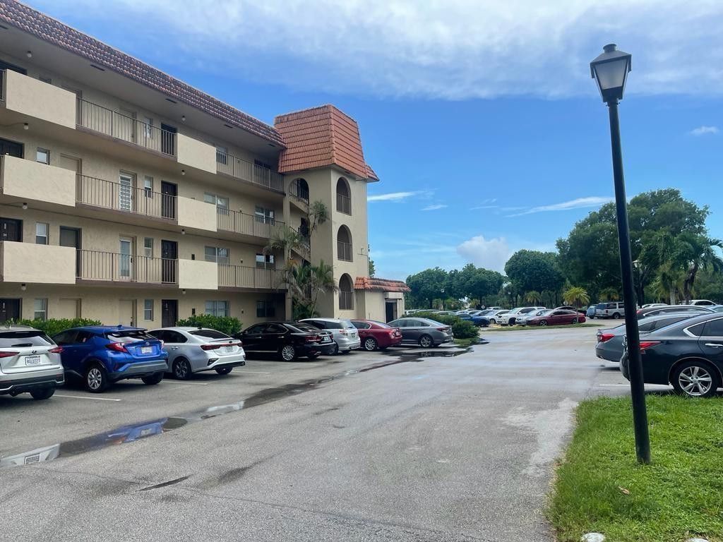 Photo of 6061 N Falls Cir Drive #301, Lauderhill, FL 33319 (MLS # B26000121)