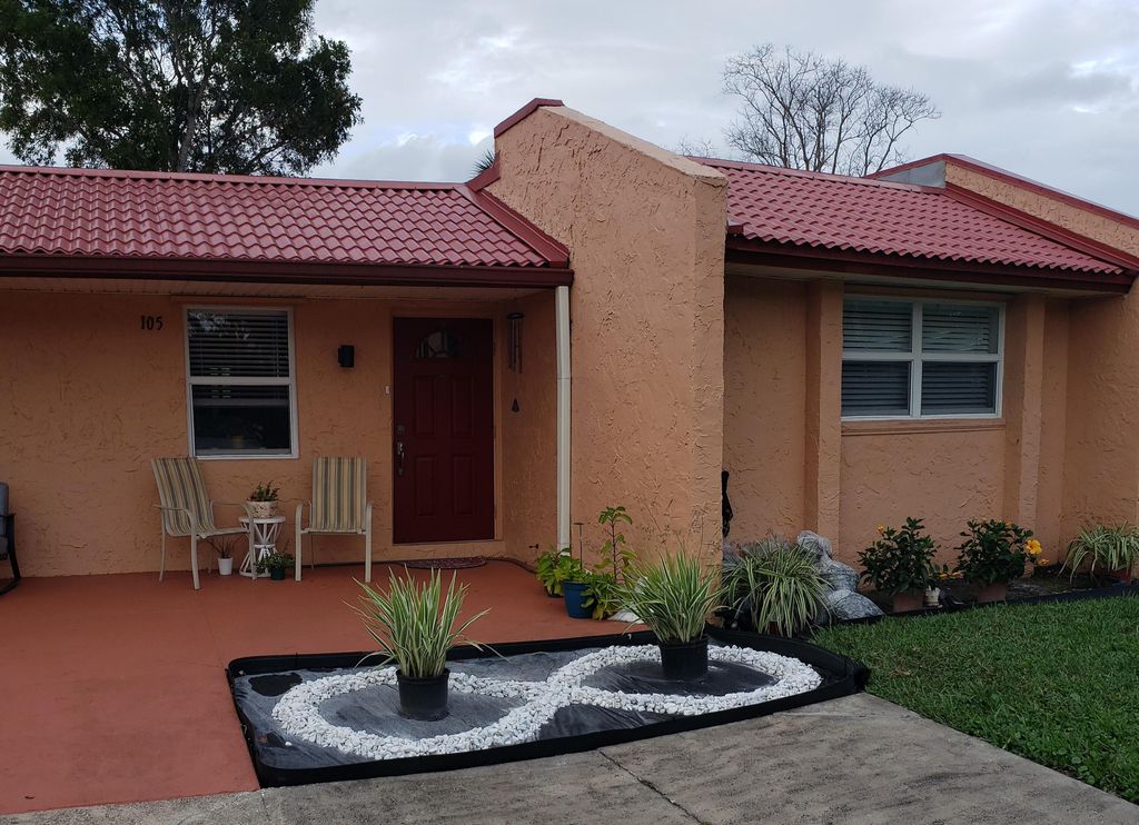 Photo of 105 Lake Anne Drive, West Palm Beach, FL 33411 (MLS # R10768792)