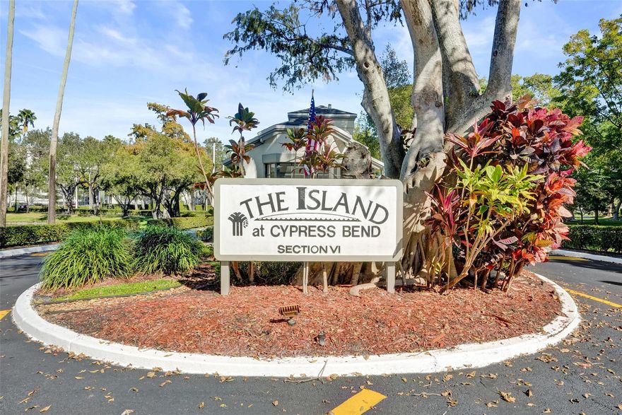 Welcome to Cypress Island at Cypress Bend in Pompano Beach! This spacious Corner unit offers over 1,200 sq. ft. of comfortable living space with 2 beds/2 baths. Featuring tile throughout the main living areas, brand new carpet in bedrooms, fresh paint, this condo is Move in Ready. Open Kitchen with counter seating flows into the living space, leading to the screened in corner balcony with lake views and accordion storm shutters. In-unit washer & dryer. Pet friendly up to 20 pounds and the building is up to date w/inspections & solid reserves. Enjoy resort style amenities sparkling pool, fitness center, pickle ball and beautifully maintained grounds. Ideally located near The Pomp- Harrah's Casino, Topgolf, Publix, and plenty of shops and restaurants. Don't miss this fantastic opportunity.