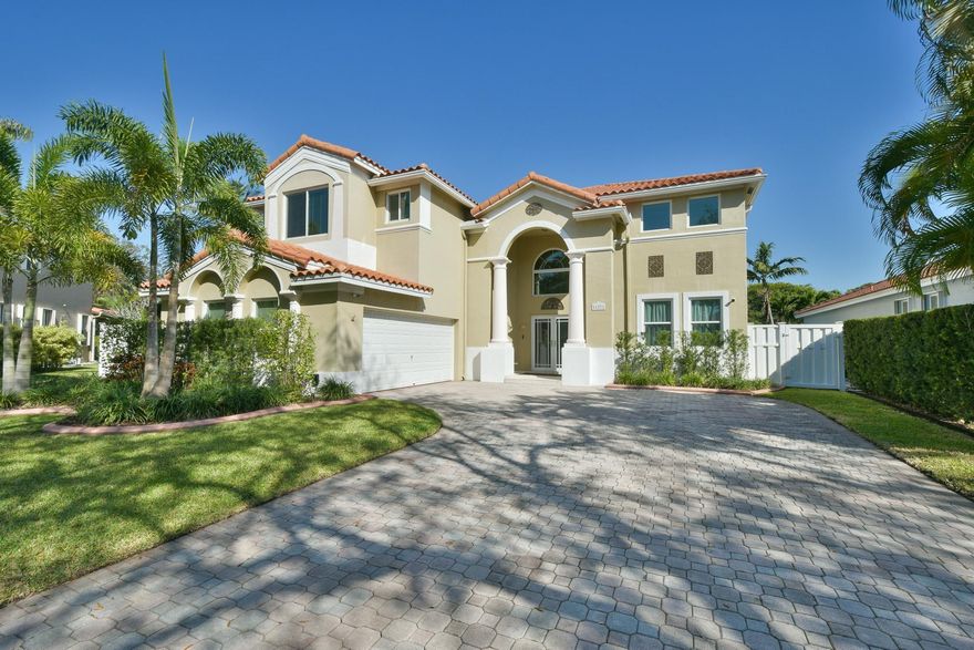 WELCOME HOME TO THIS BEAUTIFULLY LANDSCAPED AND MAINTAINED 5 BEDROOM/4 BATH HOME WITH WATERFRONT VIEW, 6' WHITE PRIVACY FENCE, HEATED/COOLED POOL/SPA W/OVERSIZE DECK & SCREENED-IN PATIO FOR ENJOYING THE OUTDOORS. CUSTOM GOURMET KITCHEN W/QUARTZ COUNTERTOPS, MARBLE BACKSPLASH, SOFT-CLOSE CABINETS, & HIGH-END S/S APPLIANCES. ELEGANT ENTRANCE W/20 FT CEILINGS. HIGH IMPACT DOORS/WINDOWS HAVE LIFETIME WARRANTY. UPSTAIRS ARE TWO MASTER SUITES & TWO BEDROOMS. PRIMARY MASTER IS SPACIOUS W/RECESSED CEILING, 2 WALK-IN CLOSETS, LARGE BATHROOM W/SEPARATE TUB/SHOWER. ONE BEDROOM/BATH DOWNSTAIRS. 2 A/C UNITS W/BI-POLAR IONIZATION-KEEP AIR CLEAN. 2 CAR GARAGE W/LARGE DRIVEWAY. HOA INCLUDES: GATED SECURITY, FRONT LAWN MOWING, CABLE, CLUBHOUSE W/FITNESS CENTER, POOL, TENNIS & BASKETBALL COURTS, PLAYGROUND.