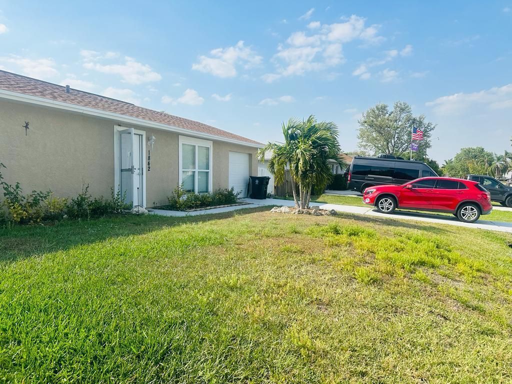 Photo of 1842 SW Morelia Lane, Port Saint Lucie, FL 34953 (MLS # R11095895)