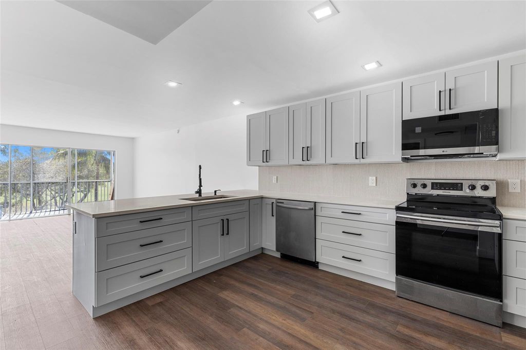 Photo of 2800 N Palm Aire Drive #310, Pompano Beach, FL 33069 (MLS # F10552331)