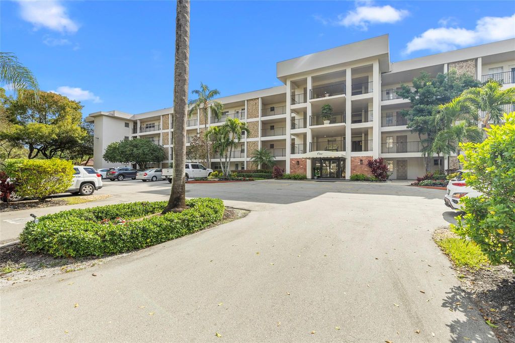 Photo of 2800 N Palm Aire Drive #310, Pompano Beach, FL 33069 (MLS # F10552331)