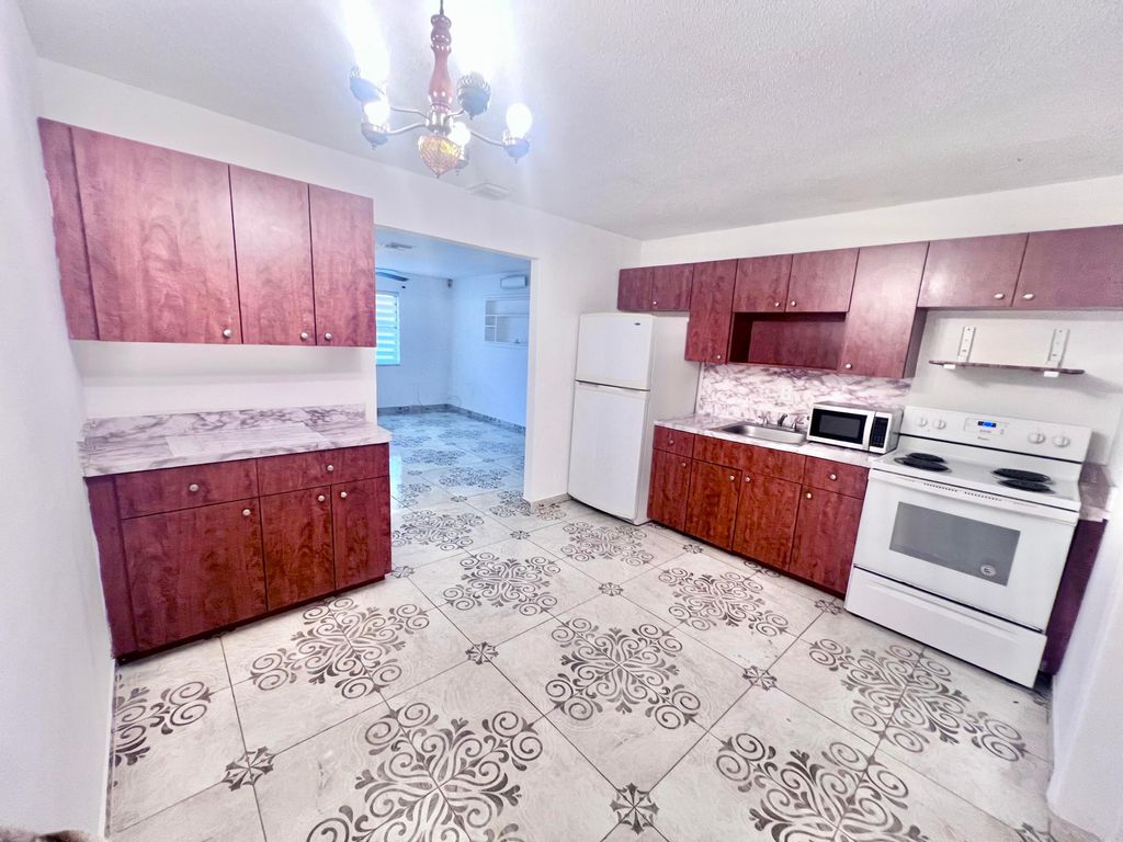 Photo of 4630 Myrtle Lane, West Palm Beach, FL 33417 (MLS # R11160017)