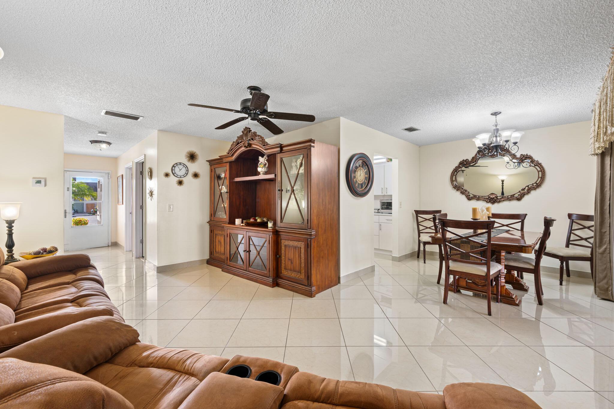 Turnkey 1-bedroom, 1-bathroom condo in the desirable 55+ Cresthaven community, now available for rent. This well-maintained unit features ceramic tile throughout, a spacious layout, and a Florida room that can be used as a den, home office, or guest space. The upgraded kitchen includes custom cabinetry and ample counter space. Washer and dryer are included inside the unit for added convenience.Located directly across from the community clubhouse, pool, and tennis courts. Enjoy easy access to major highways and shopping centers. Two assigned parking spaces.Offered furnished or unfurnished--tenant's choice. Pets subject to owner approval. Rent includes water, cable, and exterior maintenance.Don't miss this opportunity to live in a peaceful and centrally located community!