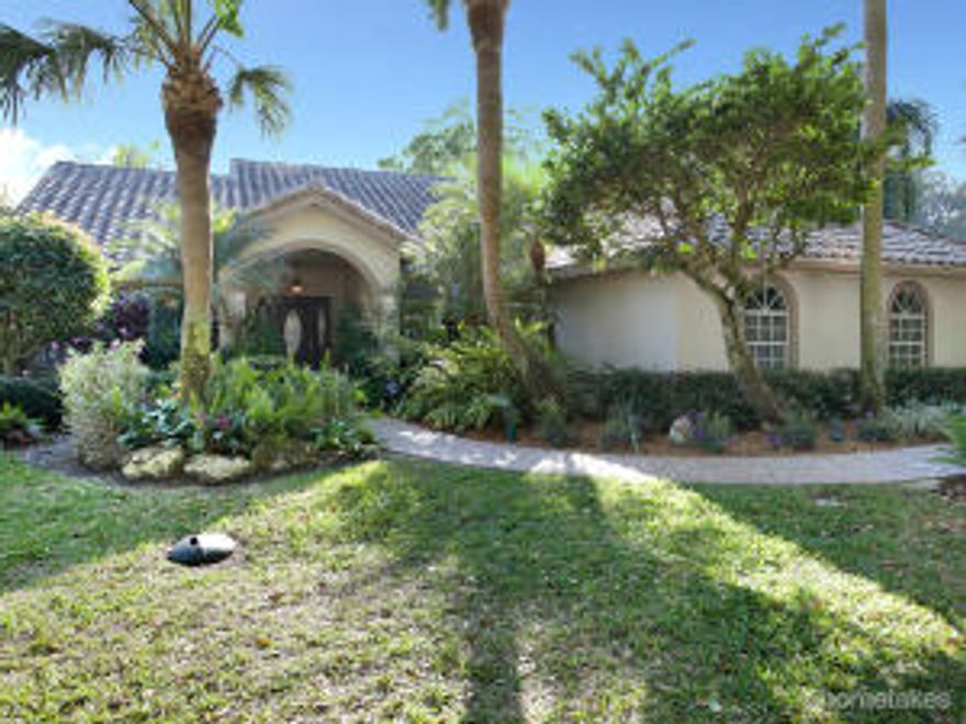 Completely renovated CBS 3 bedroom 2 bath home lot in Jupiter's desirable Shores neighborhood. Located just minutes to shopping, dining, the beaches and Jupiter's NEW Harbourside entertainment district on the intracoastal and the Riverwalk. This home has lake access, lush tropical landscaping, brick paver walkways, and a beautiful front entry with glass panels providing beautiful curb appeal. Inside are open living areas with cathedral ceilings, a split bedroom floor plan, and 2,125 square feet of fabulous one-story Florida living. Designer finishes include 20'' marble flooring, custom cabinetry, granite countertops, stainless appliances, and crown molding. Relax in your HUGE master suite with the spa-like master bath, extra large walk in closet and a private sitting room with remote