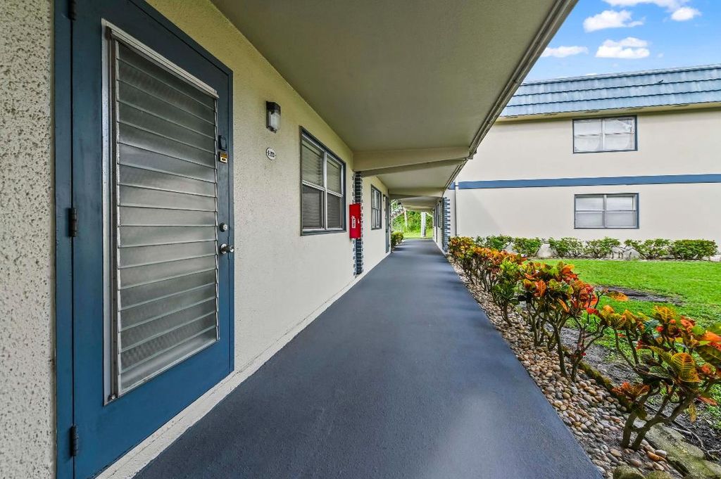 Photo of 213 Brittany Drive E, Delray Beach, FL 33446 (MLS # R11131884)