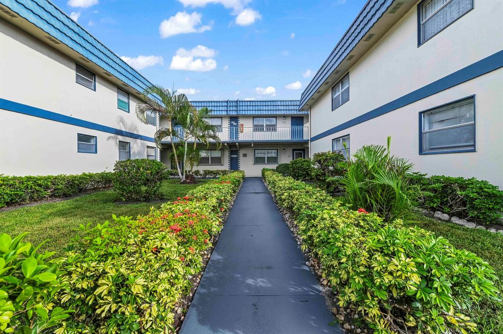 Photo of 213 Brittany Drive E, Delray Beach, FL 33446 (MLS # R11131884)