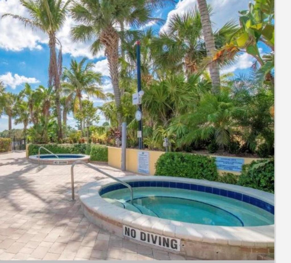 Photo of 335 October Street, Palm Beach Gardens, FL 33410 (MLS # R11004086)