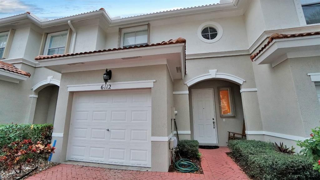 Photo of 6112 Seminole Gardens Circle, Riviera Beach, FL 33418 (MLS # R10775971)