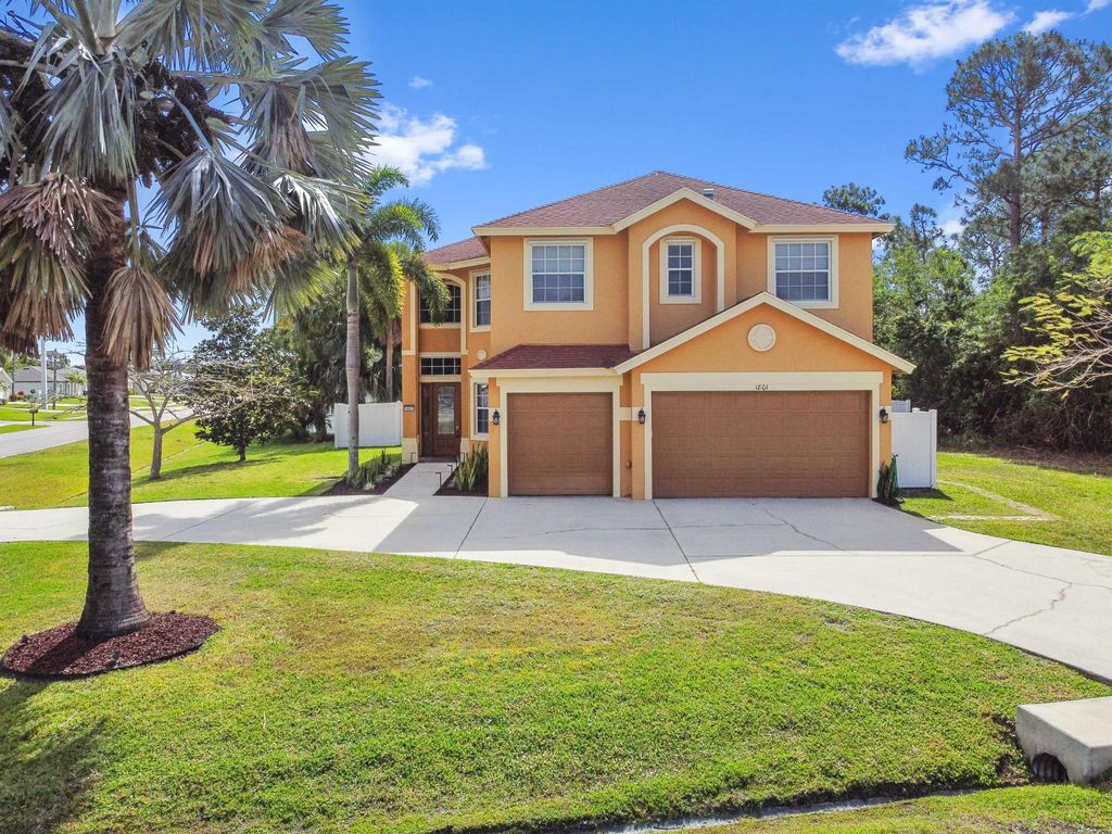 Photo of 1801 SW Hudson Street, Port Saint Lucie, FL 34953 (MLS # R10979415)