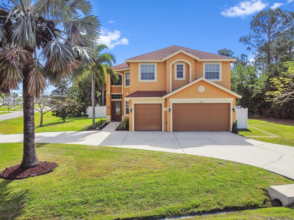 Photo of 1801 SW Hudson Street, Port Saint Lucie, FL 34953 (MLS # R10979415)