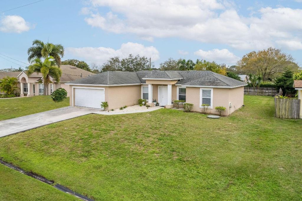 Photo of 216 SE Eyerly Avenue, Port Saint Lucie, FL 34983 (MLS # R10953406)