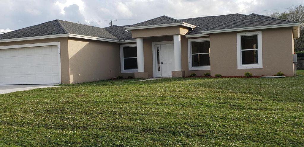 Photo of 216 SE Eyerly Avenue, Port Saint Lucie, FL 34983 (MLS # R10953406)