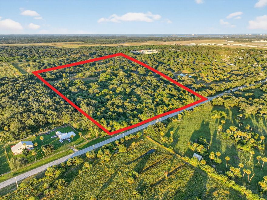 Located in the St. Lucie Foreign Trade Zone, 21.98 Acres Zoned Industrial Light by St. Lucie County.    1.2 Miles from Entrance to Treasure Coast International Airport and Business Park. A standout choice for manufacturing, logistics and transportation hubs, light industrial operations, freight and cargo services, and heavy equipment storage offering exceptional potential for a wide range of development opportunities. This parcel provides an unmatched opportunity for developers and investors to leverage the strong and accelerating demand for industrial properties in this expanding region. Easy access to I-95 and U.S. Highway1. Prime location on the same street as Treasure Coast International Airport, Maverick Boat Group, Pursuit Boats,East Coast Truss and Treasure Coast Vault.