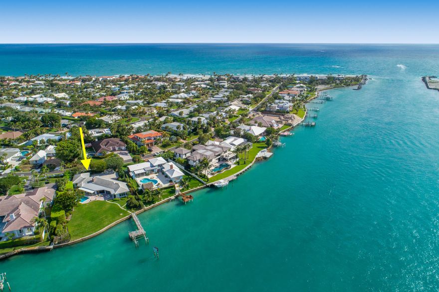 One of the premier waterfront homesite on the east coast of FL directly on the blue water where the Jupiter Inlet meets the Intracoastal waterway overlooking the historic Jupiter Lighthouse. This charming single-story home on spectacular point lot, features panoramic views of Jupiter Inlet and Intracoastal Waterway, including Jupiter Lighthouse. Spacious floor plan includes 4 bedrooms, 3 bathrooms, 2 car garage and large kitchen with custom cabinetry overlooking the private pool, yard and dock with boat lift. 4th bedroom is small and can also be used as a den.