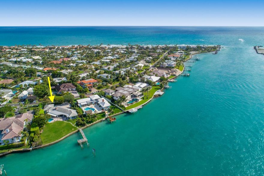 One of the premier waterfront homesite on the east coast of FL directly on the blue water where the Jupiter Inlet meets the Intracoastal waterway overlooking the historic Jupiter Lighthouse. This charming single-story home on spectacular point lot, features panoramic views of Jupiter Inlet and Intracoastal Waterway, including Jupiter Lighthouse. Spacious floor plan includes 4 bedrooms, 3 bathrooms, 2 car garage and large kitchen with custom cabinetry overlooking the private pool, yard and dock with boat lift. 4th bedroom is small and can also be used as a den.