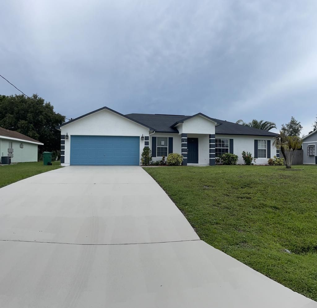 Photo of 1058 SW Provincetown Lane, Port St Lucie, FL 34953 (MLS # R10906511)