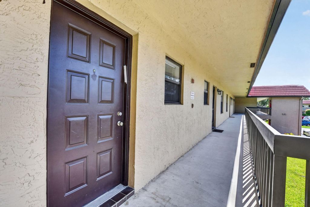 Photo of 21895 Lake Forest Circle #201, Boca Raton, FL 33433 (MLS # B26046820)