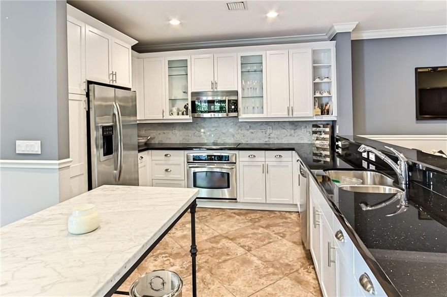 Beautifully furnished rental minutes from downtown Delray and the beaches.  3 bedroom 3.5 bath single family home, plus office, also includes 3 car garage and private dip pool.  Small enclave of 31 homes called Old Palm Grove.  All impact windows, updated kitchen and baths.  Perfect annual rental for one year term.  Landscaping and alarm included in rent.  Offered for annual rent only, as per the association.  Pets will be considered on an individual basis.