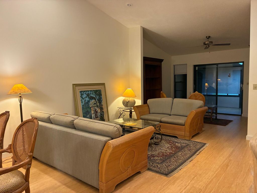 Photo of 10938 Roebelini Palm Court #B, Boynton Beach, FL 33437 (MLS # B26005001)