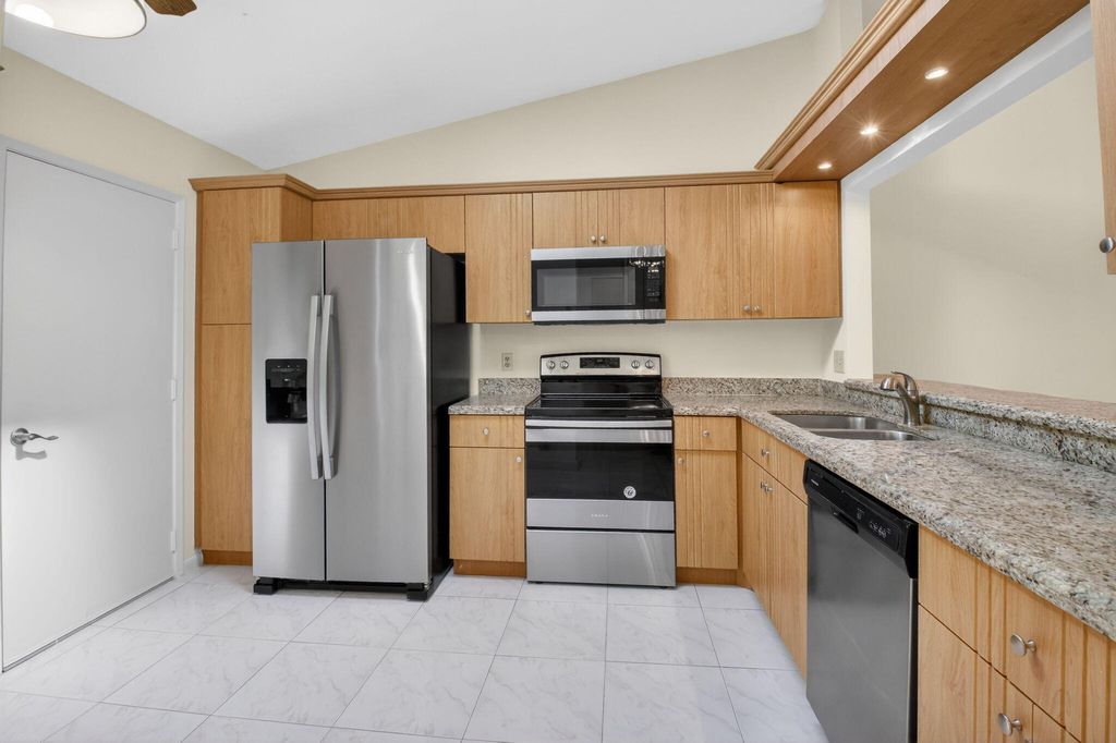 Photo of 10938 Roebelini Palm Court #B, Boynton Beach, FL 33437 (MLS # B26005001)