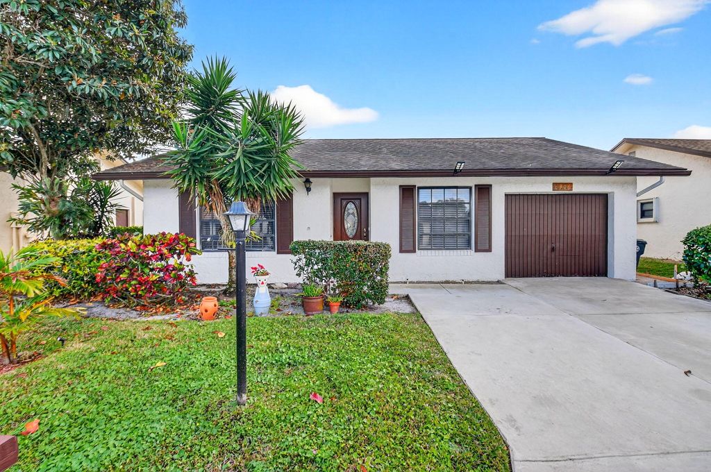 Photo of 6306 White Sabal Palm Lane, Greenacres, FL 33463 (MLS # R11164171)