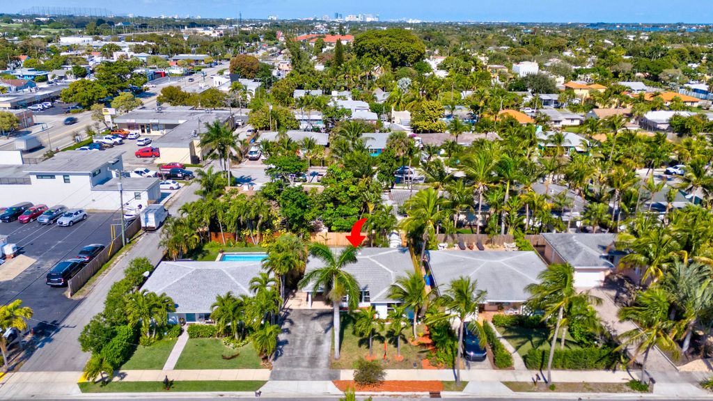 Photo of 334 Wellesley Drive, Lake Worth Beach, FL 33460 (MLS # R11061122)