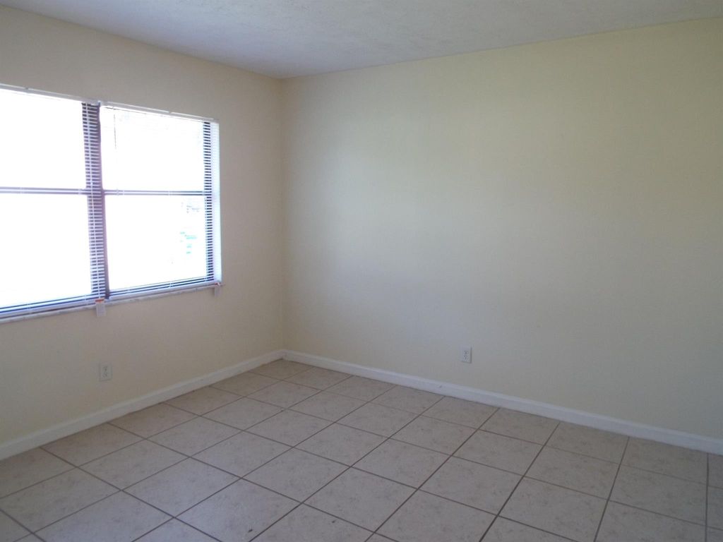 Photo of 1742 SW Garnet Street, Port Saint Lucie, FL 34953 (MLS # R11118483)