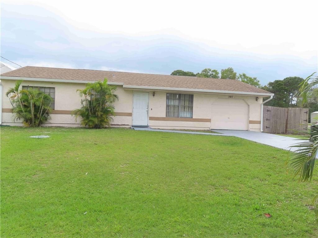 Photo of 2411 SE Avalon Rd, Port Saint Lucie, FL 34952 (MLS # F10325042)