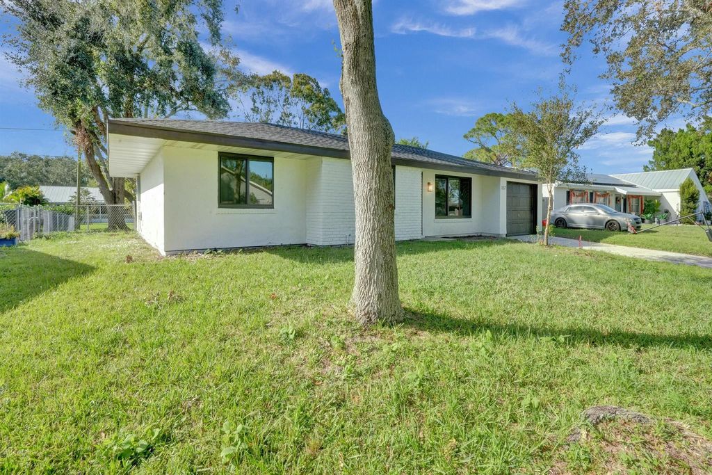 Photo of 1117 SE Stewart Road, Port Saint Lucie, FL 34952 (MLS # R11081922)