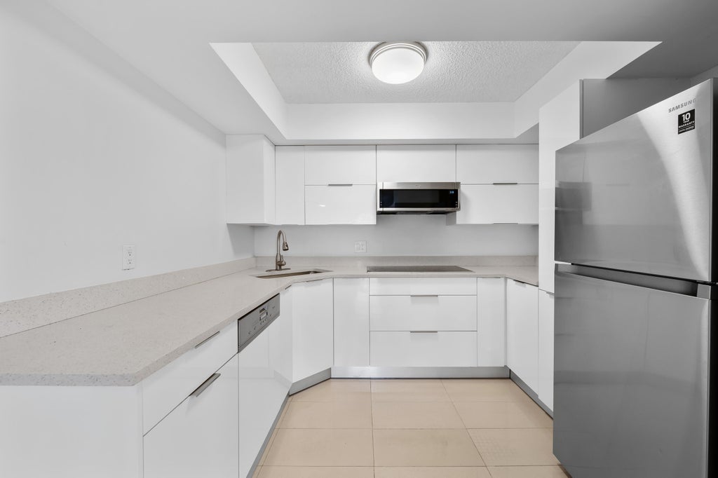 Photo of 3770 VILLAGE Drive #B, Delray Beach, FL 33445 (MLS # B26084036)