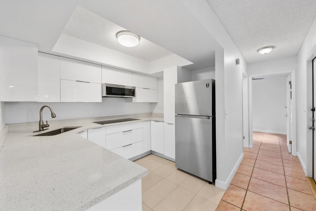Photo of 3770 VILLAGE Drive #B, Delray Beach, FL 33445 (MLS # B26084036)