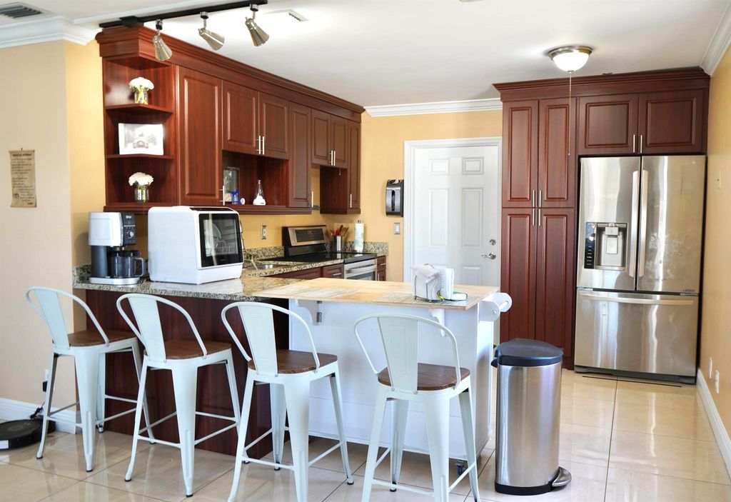 Photo of 552 Beech Road, West Palm Beach, FL 33409 (MLS # R11147933)