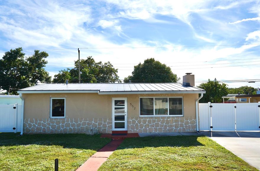 Brand new metal roof, all Impact windows and doors. AC 2023. Huge driveway so you can park Truck/RV/Boat. Very low property taxes in 2025 for an easy qualification, on public sewer.This great home welcomes you, make  it yours.