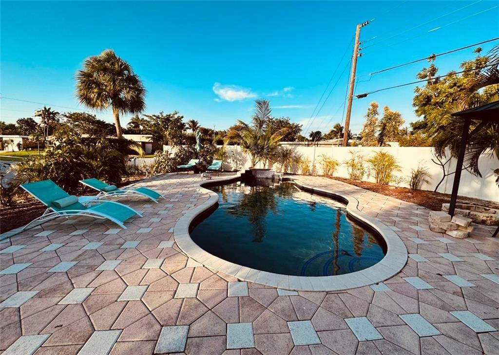 Location, Location, Location! Studio with pool access, gazebo, BBQ, fence . Studio type. 1 furnished bedroom , 1 furnished living room/ kitchenette and 1 private bathroom, fenced private gazebo covered patio outside the door entrance. Private entrance. Includes electricity, water, internet -all utilities. Pool and lawn maintenance included. Pool is shared with landlord -pool is a common area.