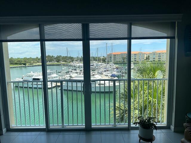 Welcome to refined coastal living at Harbour Isle! This spacious 2-bedroom, 2-bath condo spans approximately 1,989 sq ft and is situated on the 3rd floor, offering beautiful marina and water views. Open-concept living & dining, accentuated by high volume ceilings and natural light. Bonus room/den offering flexible layout options for work or relaxation. Gourmet kitchen with stainless steel appliances, granite countertops, and functional layout. Master suite with en suite bath featuring dual sinks, a Roman tub, and separate shower. Split-bedroom floor plan ensures privacy and separation. Upscale finishes: tile and carpet flooring, plantation shutters, and in-unit laundry for added convenience. Amenities: clubhouse, swimming pool, spa, fitness center, tennis courts, bocce court, dog