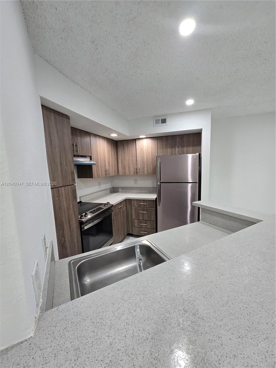 Photo of 595 Vista Isles Drive #1913, Sunrise, FL 33325 (MLS # A12045047)