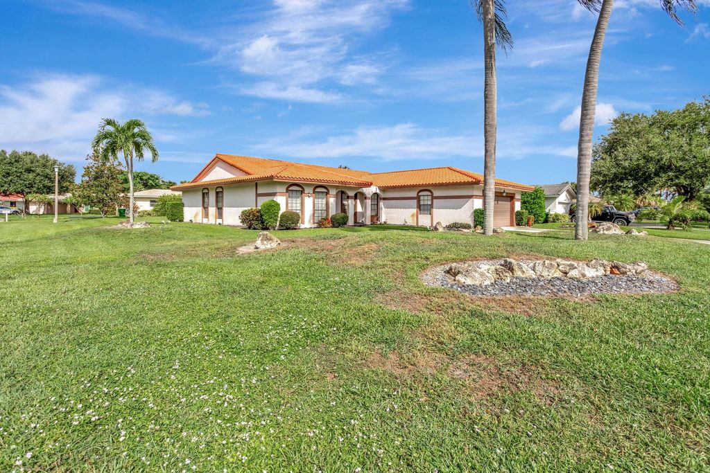 Photo of 10072 Ramblewood Dr, Coral Springs, FL 33071 (MLS # F10530716)