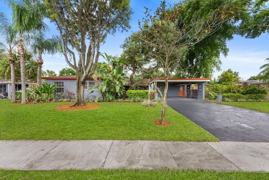 Charming 3BR/2BA single-family home in Margate with lush tropical landscaping and no HOA! Spacious living area with wood-style floors, large windows, updated lighting. Kitchen offers ample cabinetry, stainless steel appliances, and dining area. Lovely Primary suite plus two generous bedrooms. Modern bathrooms include a remodeled walk-in shower with frameless glass. Enjoy Florida living in the screened patio, private fenced backyard, and pergola surrounded by greenery.  Perfect for entertaining. Added features: NEC approved Generator connection,separate laundry room with full-size washer/dryer, 2 vehicle carport with extended driveway, and plenty of storage. Centrally located by shopping, dining, schools, highways, beaches. Move-in ready! Owner offering new updated AC system! 24 hr notice