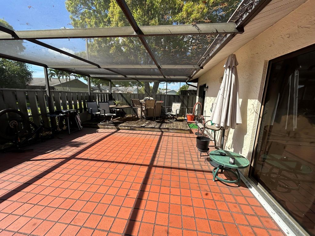 Photo of 1327 Peppertree Trail #C, Fort Pierce, FL 34950 (MLS # R11079126)