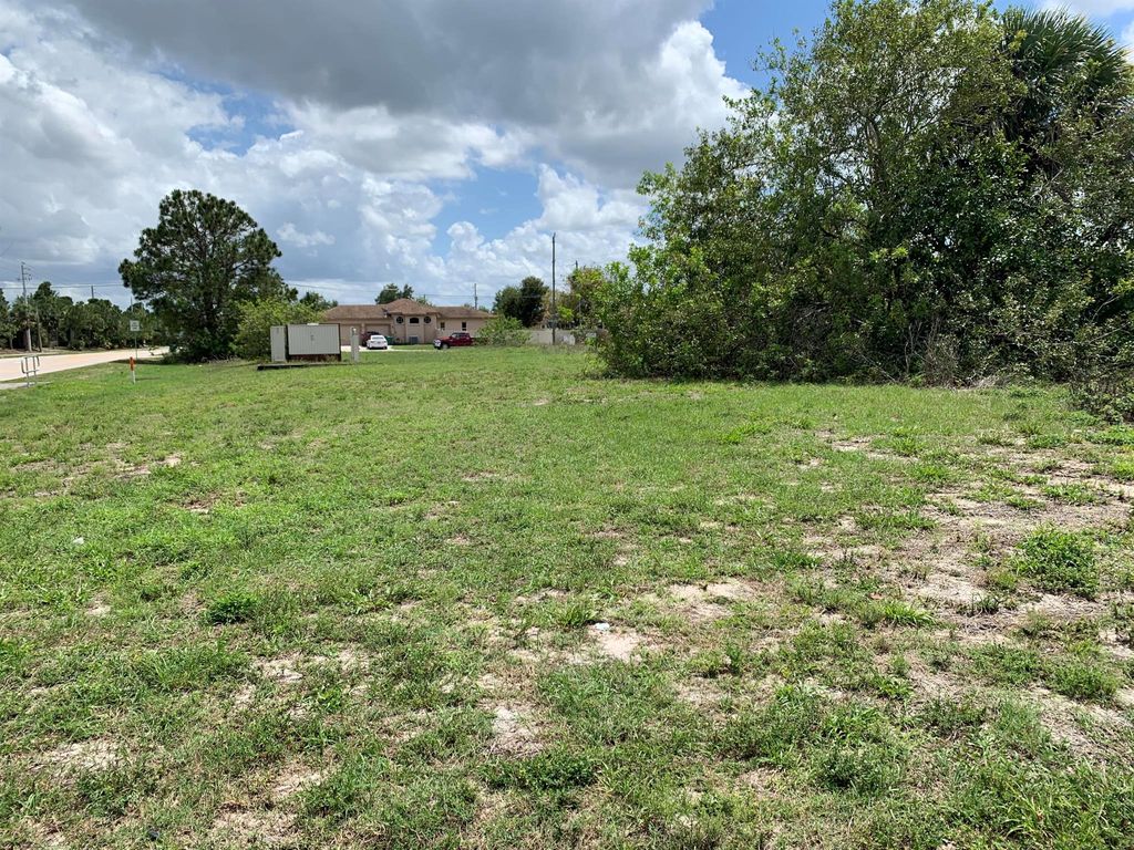 Photo of 3402 SW Darwin Boulevard, Port St Lucie, FL 34953 (MLS # R10887547)