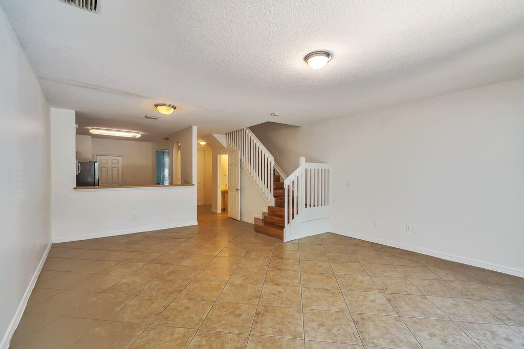 Photo of 1974 Alamanda Way, Riviera Beach, FL 33404 (MLS # R10931999)