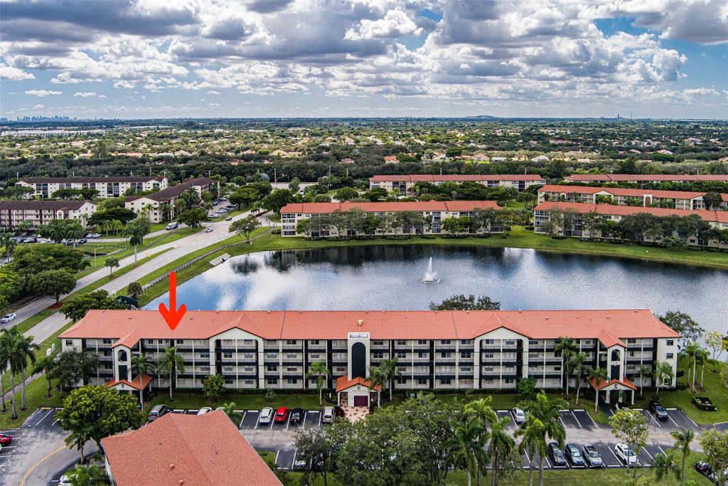 Photo of 12900 SW 13th St #403E, Pembroke Pines, FL 33027 (MLS # F10532434)