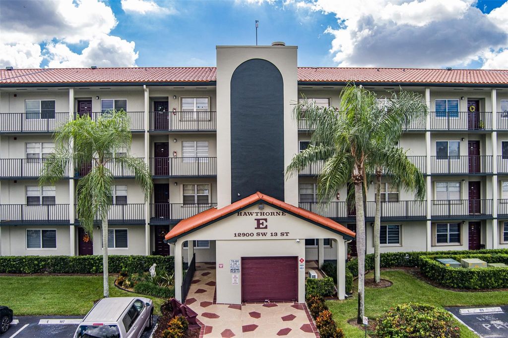 Photo of 12900 SW 13th St #403E, Pembroke Pines, FL 33027 (MLS # F10532434)