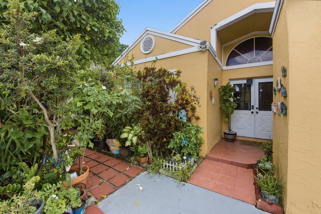 Photo of 3680 Marlberry Lane, Miramar, FL 33025 (MLS # B26074862)